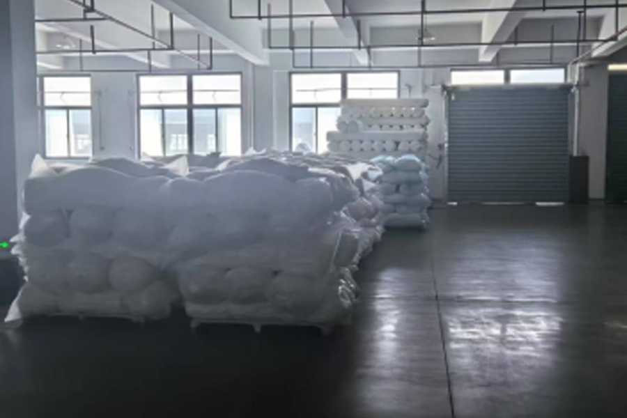 Área de producción hasta entrega de tela gris.