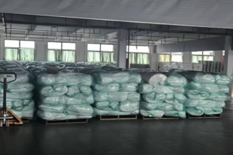 Área de producción hasta entrega de tela gris.